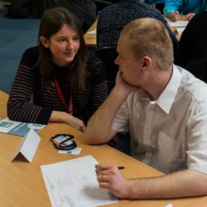 Financial Advocate Maddy working with person at workshop